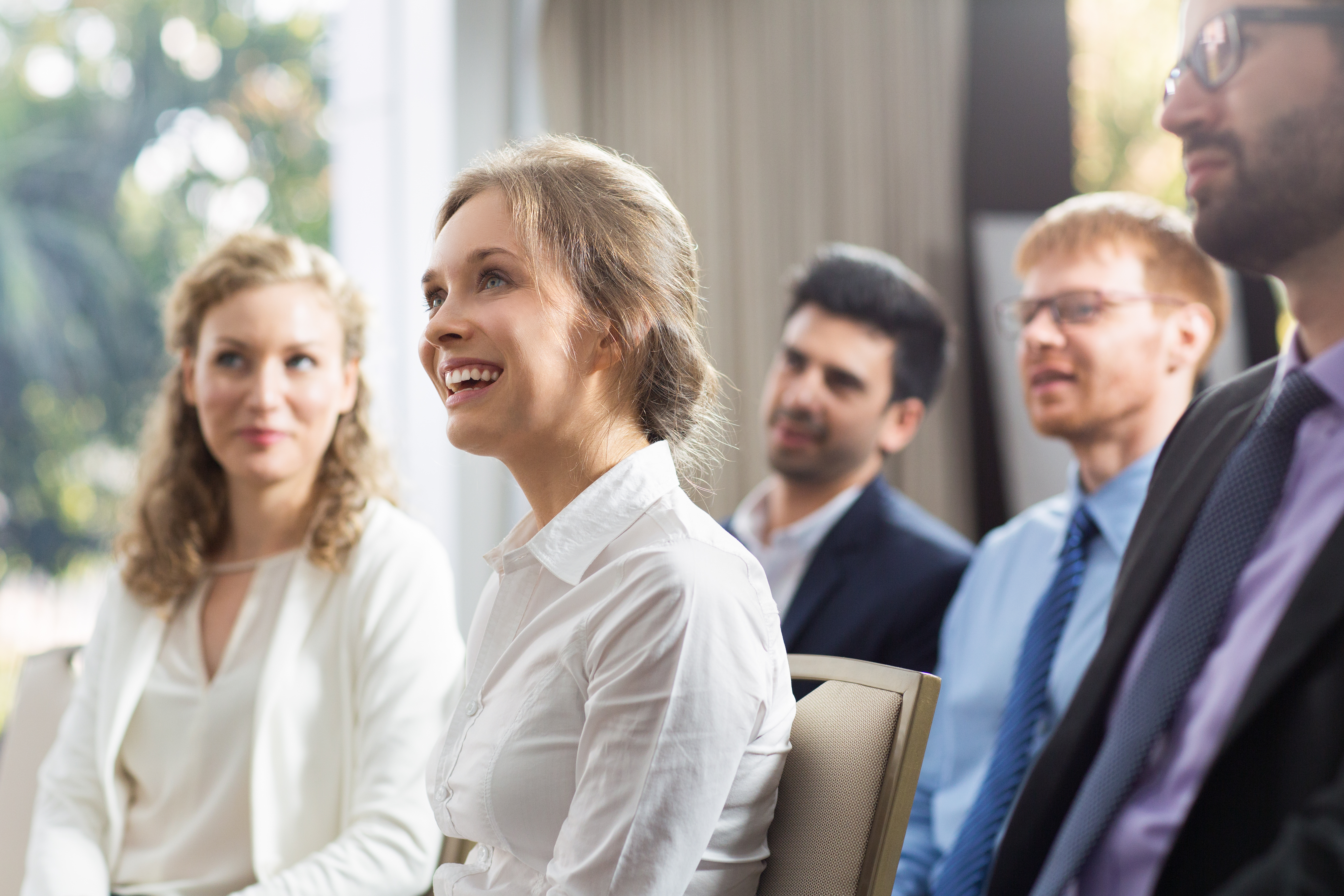 woman-sitting-public-smiling.jpg